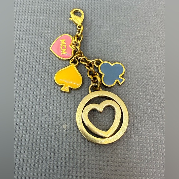 MCM Accessories - EUC MCM Gold Bag Charm with Heart and Colorful Charms Keychain